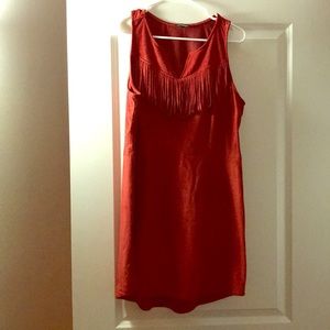 Express dress or wear as shirt with skinny jeans.